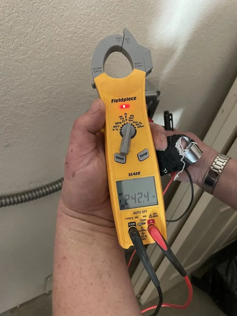 Voltage testing with clamp meter during Generator Installation in Brookfield
